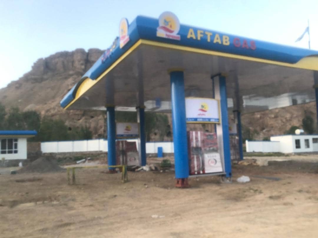 Aftab Gas station in a mountainous setting with blue canopy